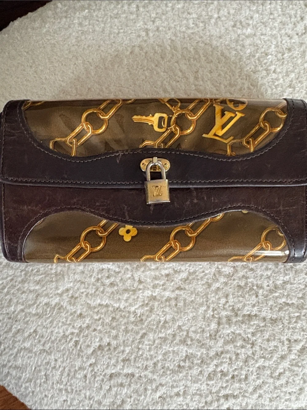 Louis Vuitton Monogram Charms Porte-Monnaie Wallet in brown (7.5 x 4in.)